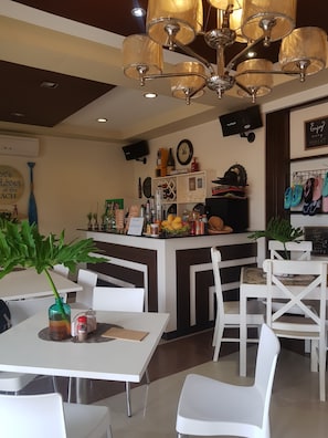 Breakfast, lunch, dinner served; local cuisine