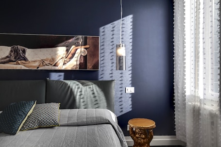 2 habitaciones, tabla de planchar con plancha, cunas y wifi gratis