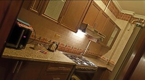 Comfort Apartment, 3 Bedrooms | Private kitchen | Fridge, microwave, stovetop, dishwasher - Chez Lay (New Cairo)