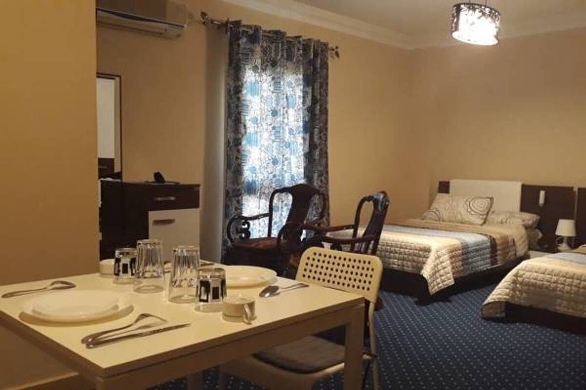 Memory foam beds, in-room safe, laptop workspace, WiFi (free)