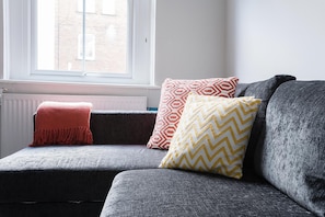 Apartment, 4 Bedrooms | Living area | Flat-screen TV