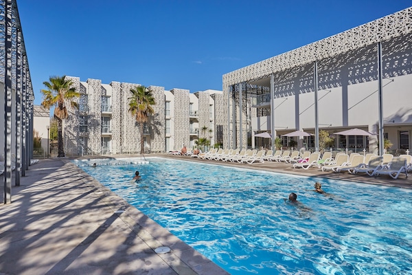 Outdoor pool, sun loungers