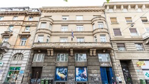 A historic building with classical architecture, featuring large windows and a central entrance. - King's Street Apartments (Zagreb)