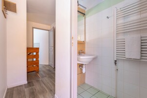 Dúplex familiar, 4 habitaciones | Baño | Toallas