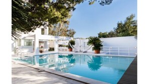 Outdoor pool, sun loungers