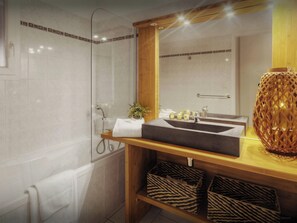 Baignoire, articles de toilette gratuits, sèche-cheveux