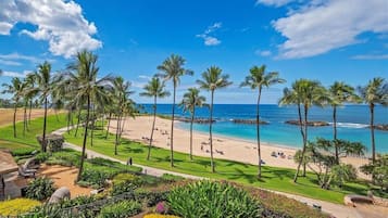 On the beach, sun-loungers, beach towels