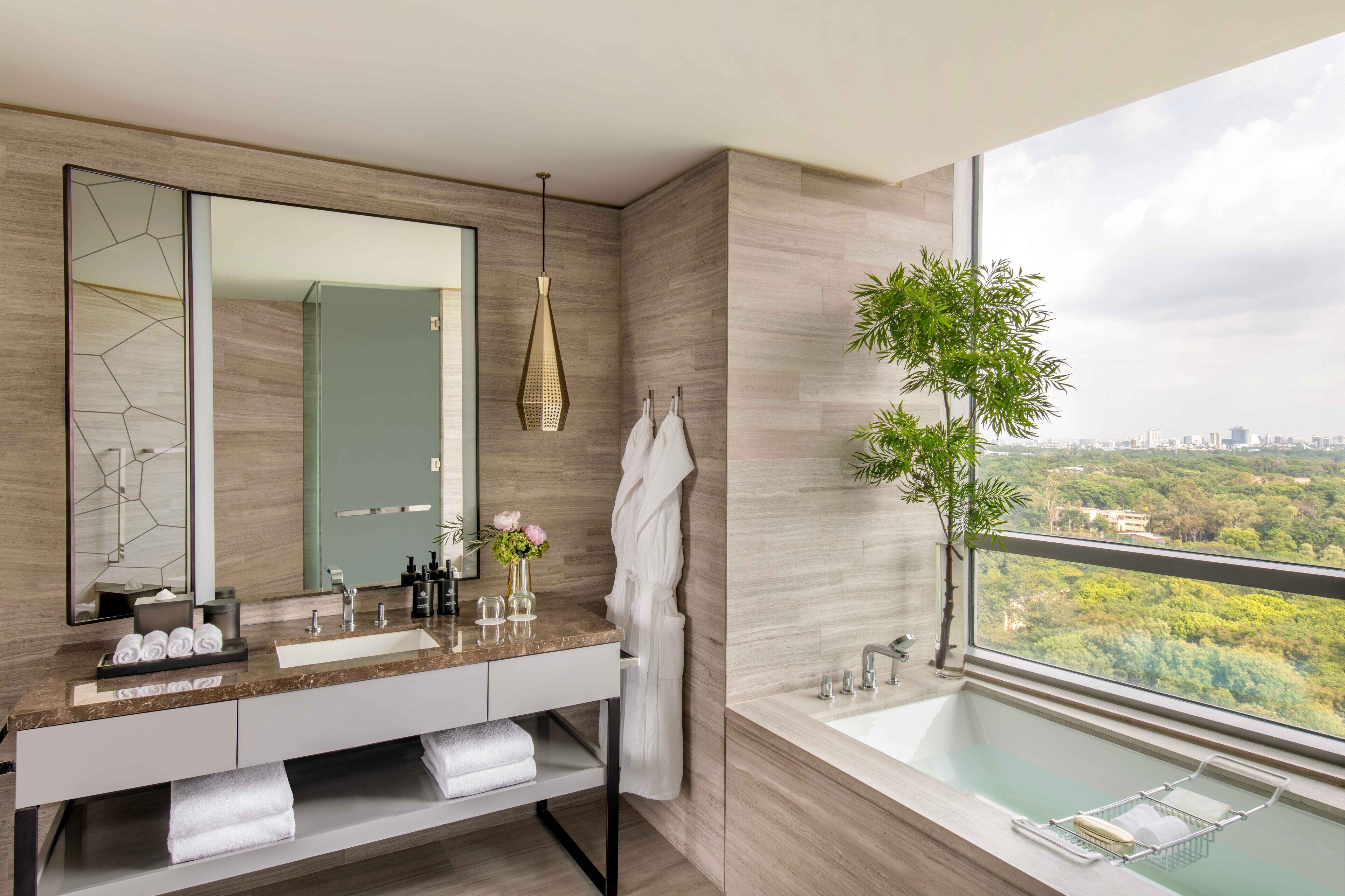 separate bathtub and shower, deep-soaking bathtub, rainfall showerhead