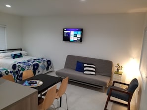 Estudio Confort | Área de sala de estar | Televisión LCD 