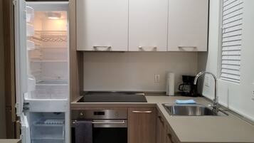 Comfort Studio | Private kitchen | Full-size fridge, microwave, oven, stovetop