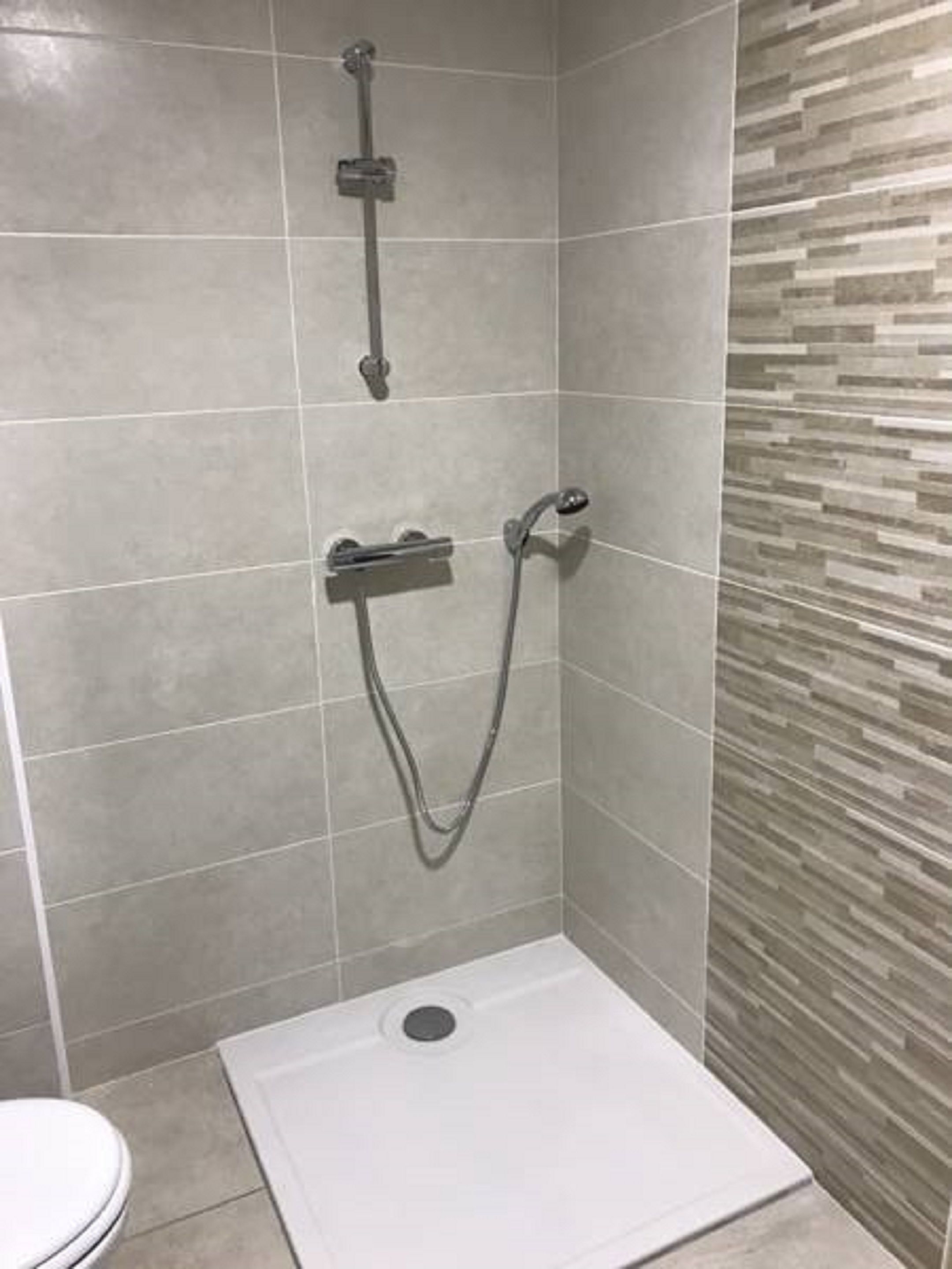 deep-soaking bathtub, free toiletries, hair dryer, towels