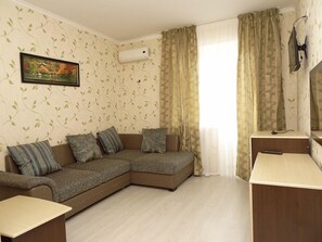 주니어 스위트, 침실 1개 | 거실 | 평면 TV