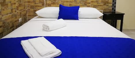 Chambre Triple | Minibar, rideaux occultants, Wi-Fi gratuit, draps fournis