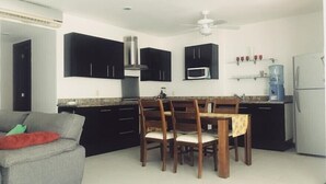 Comfort Apartment, 2 Bedrooms, 2 Bathrooms, Poolside | Living area | Flat-screen TV - Tendenza villas (Playa del Carmen)