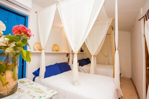 Family Villa, 4 Bedrooms, Accessible, Sea View | 4 bedrooms, desk, iron/ironing board, rollaway beds - Casa Nahua (Isla Mujeres)