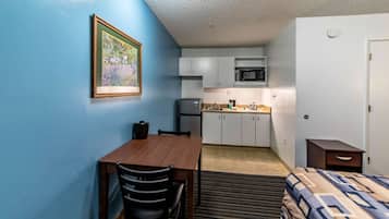 Full-sized fridge, microwave, oven, dining tables