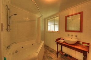 Separate tub and shower, jetted tub, free toiletries, hair dryer