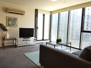 Apartment, 2 Bedrooms | Living area | Flat-screen TV - ReadySet Apartments at Sentinel (Southbank)