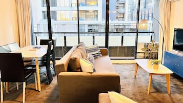 City Apartment, 2 Bedrooms | Living area | Flat-screen TV