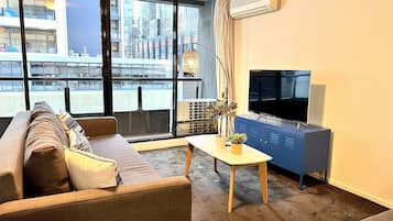 City Apartment, 2 Bedrooms | Living area | Flat-screen TV