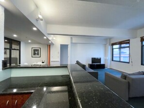 Deluxe Apartment, 3 Bedrooms | Living area | 32-inch flat-screen TV with cable channels, TV - ReadySet Apartments on King (Melbourne)