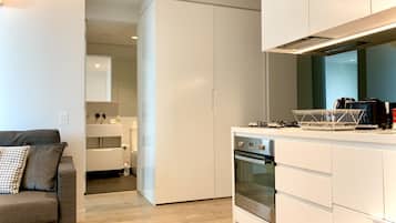 City Apartment, 2 Bedrooms | Private kitchen | Full-size fridge, microwave, oven, stovetop