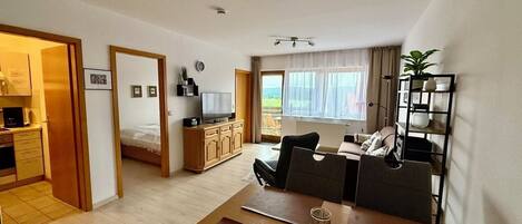 Smart TV, music library, stereo