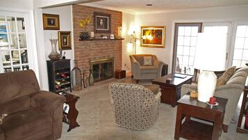 TV connectée, cheminée, console de jeux vidéo, lecteur de DVD