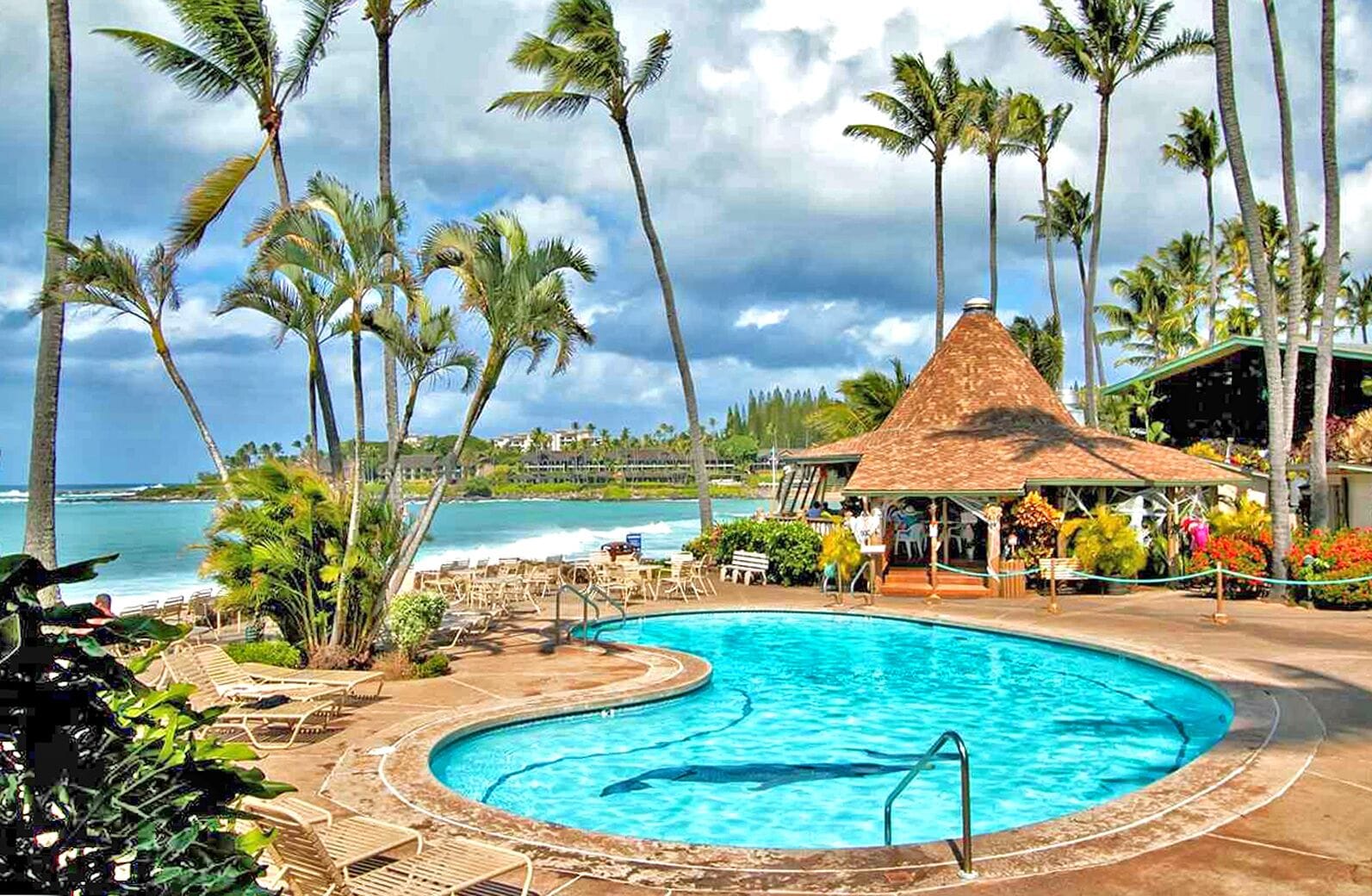 Beautiful Traditional Oceanside Tropical Jewel With Lush Gardens and Pools. 