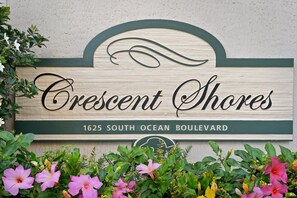 A sign for Crescent Shores at 1625 South Ocean Boulevard. - Cozy and Bright Condo with Jacuzzi Tub, Lazy River | Crescent Shores - S 1211 (North Myrtle Beach)