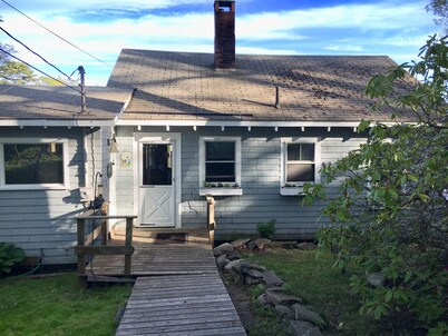 2 bedroom  1 bath, large deck and dock, on the water in peaceful cove,   Year 