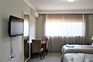 Deluxe Twin Room (The Twin Room 1 Queen 1 Single) | Individually decorated, individually furnished, desk, blackout drapes