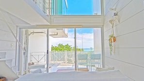 Ocean View Condominium | Living area | Flat-screen TV - Coral garden 7 pools (Yomitan)