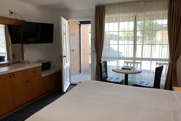 Desk, iron/ironing board, free WiFi, bed sheets