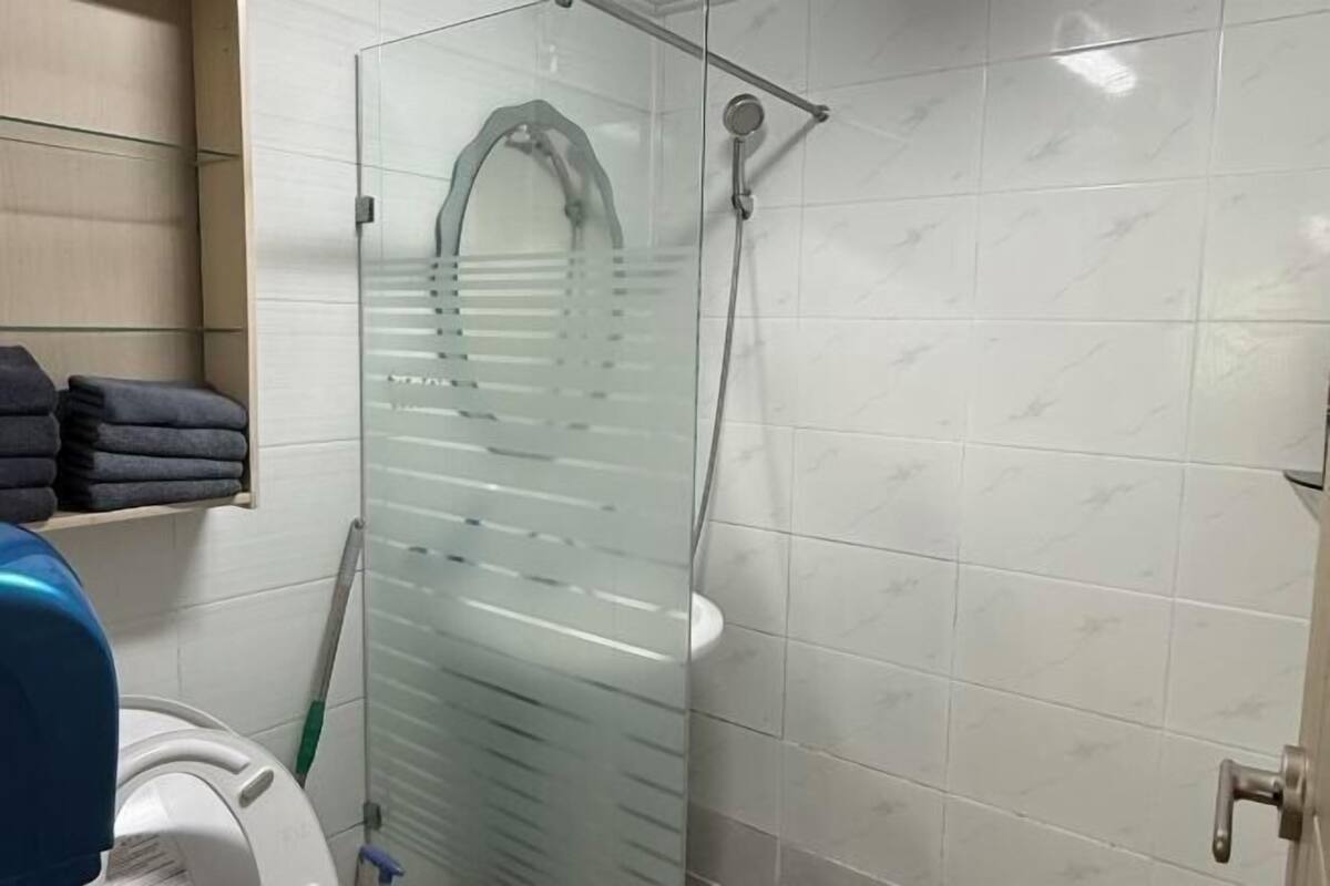 Bathroom | Shower, free toiletries, slippers, bidet