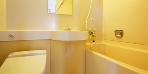 A bathroom with a white toilet, a sink, and a bathtub. - Kyomai Inn (Kyoto)