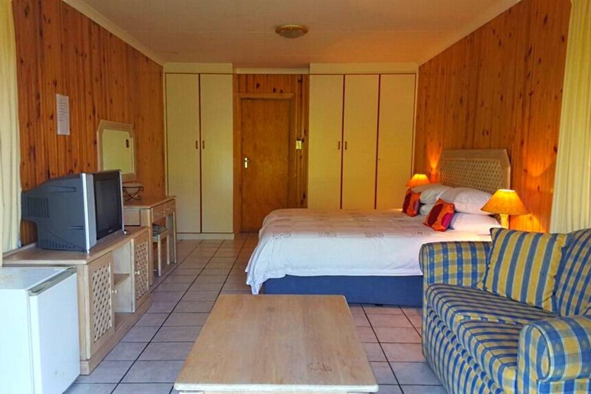 1 chambre, fer et planche à repasser, draps fournis