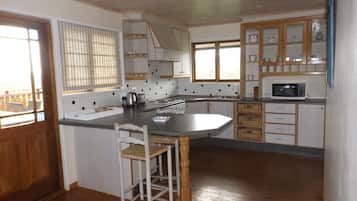 Villa, 3 Bedrooms, Beachfront | Private kitchen | Full-sized fridge, microwave, oven, stovetop