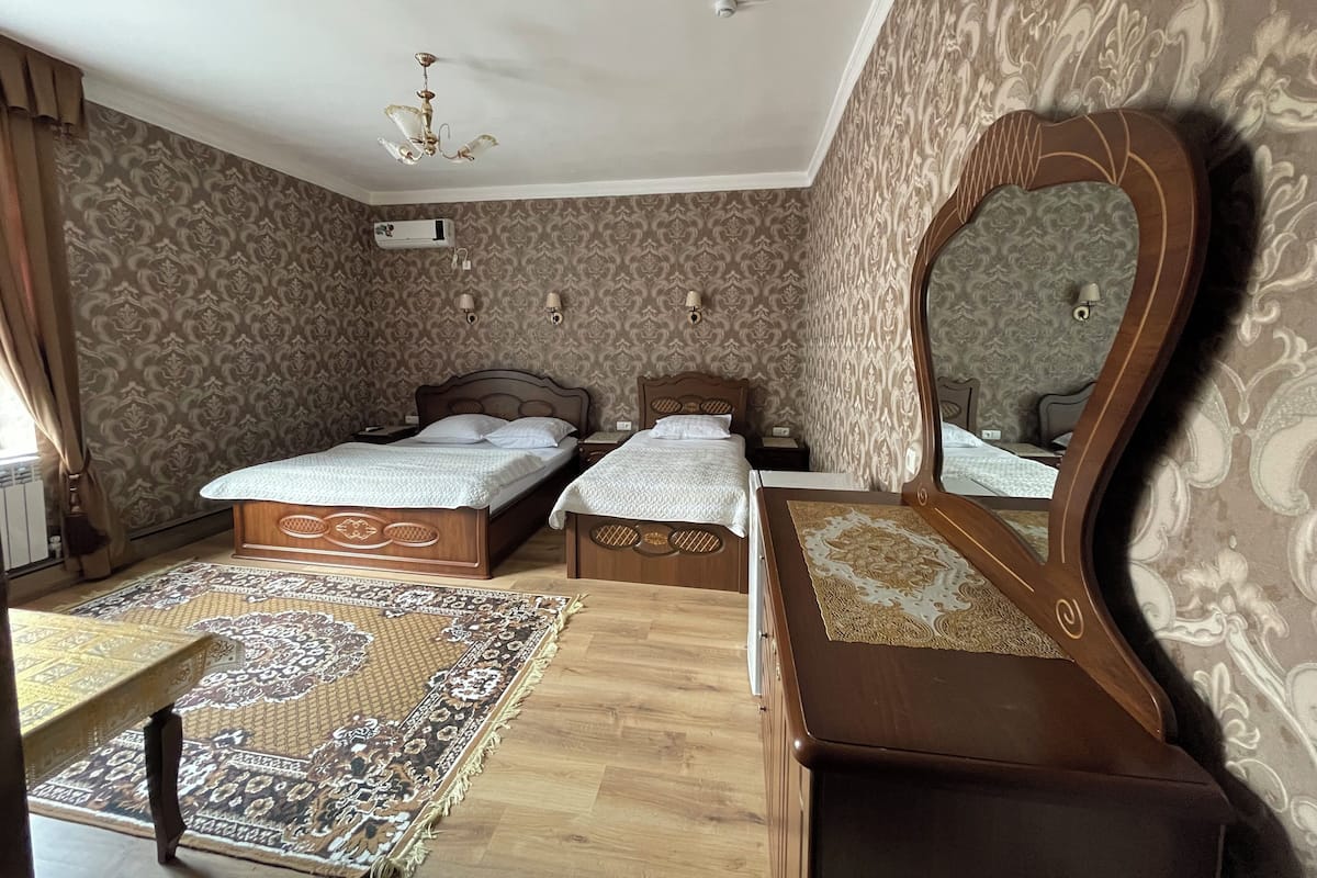Family Triple Room | Individually decorated, desk, laptop workspace, soundproofing