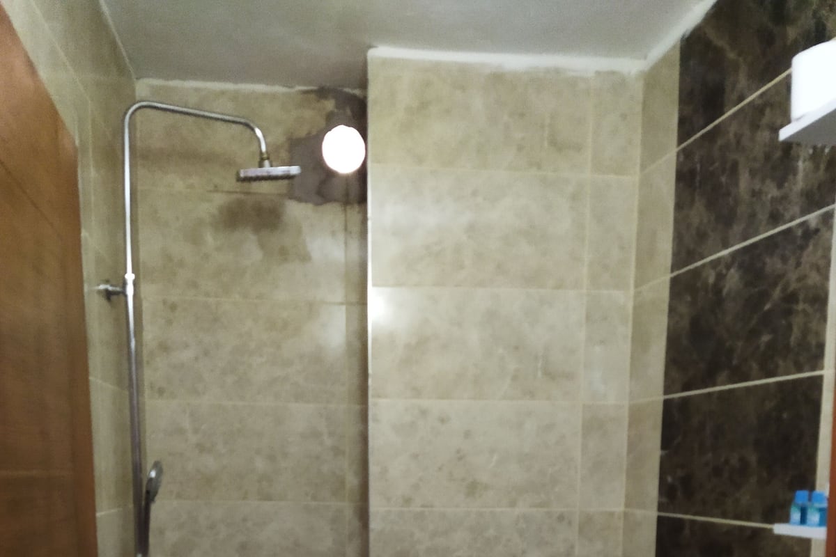Room | Bathroom | Shower, hair dryer, slippers, towels