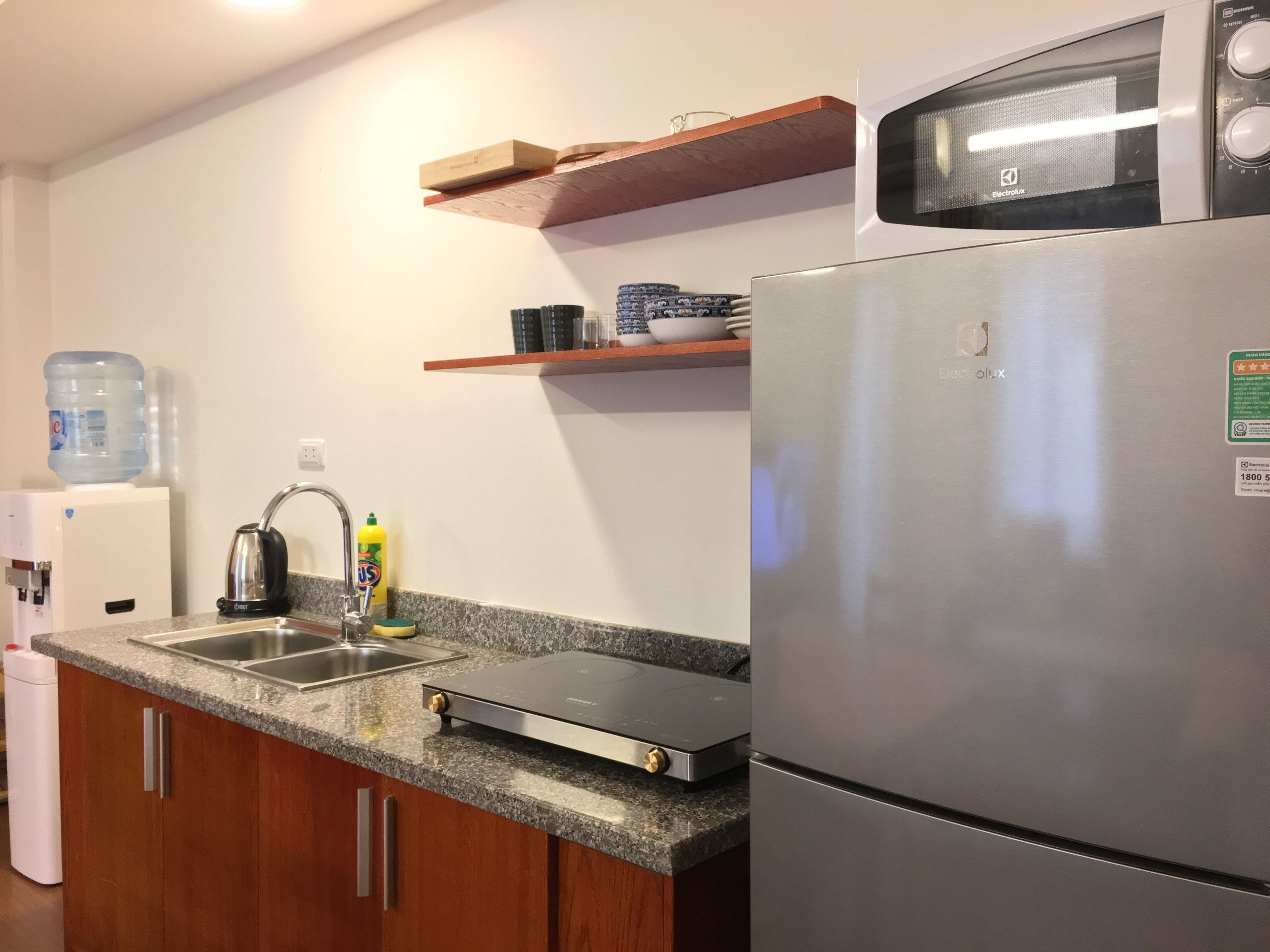 Apartamento, 1 quarto, sacada | Cozinha americana privada | Geladeira, micro-ondas, cooktop, chaleira elétrica
