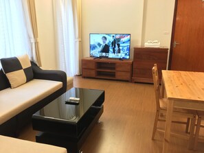 Lägenhet - 1 sovrum - balkong | Vardagsrum | 50-tums smart-tv med kabelkanaler och tv