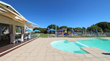 2 outdoor pools, pool umbrellas, pool loungers