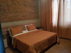 1 habitación, tabla de planchar con plancha y wifi gratis 