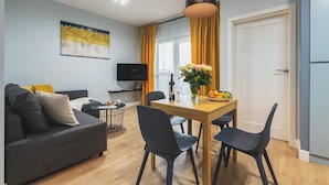 Flat-screen TV - P&O Apartments Bakalarska (Warsaw)