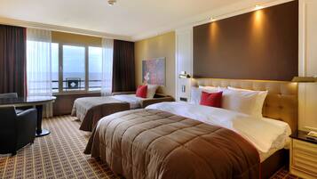 Luxe beddengoed, een minibar, een kluis op de kamer, een bureau