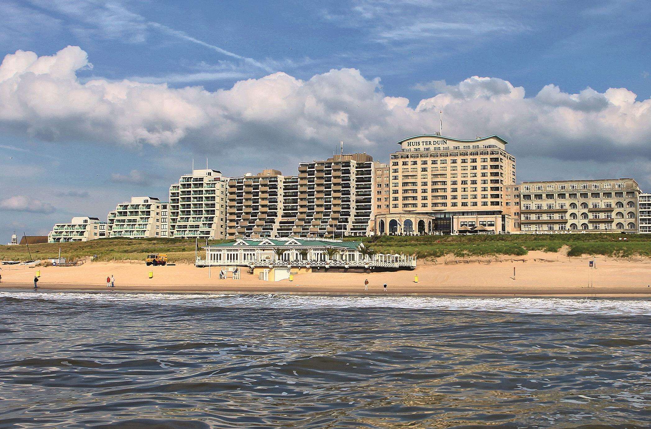 On the beach, sun loungers, beach umbrellas, beach towels