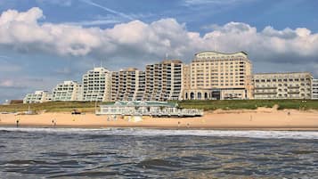 On the beach, sun loungers, beach umbrellas, beach towels