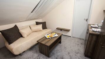 Family Room, 2 Bedrooms | Living room | TV