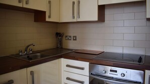 Appartamento (2 Bedrooms) | Cucina privata | Frigorifero, microonde, forno, piano cottura